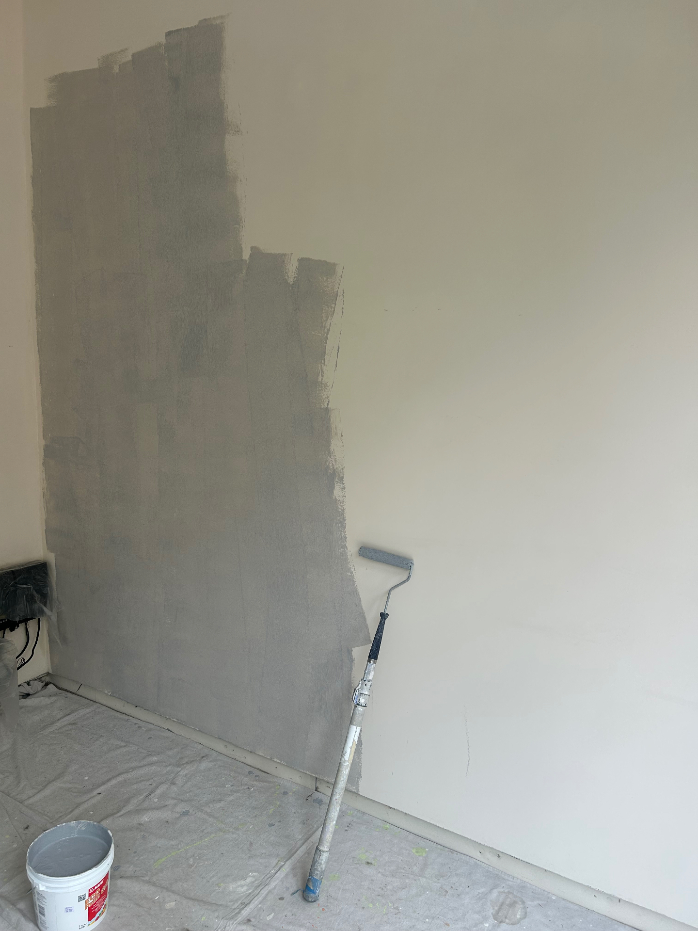 Before photo showing wall preparation for stone accent installation
